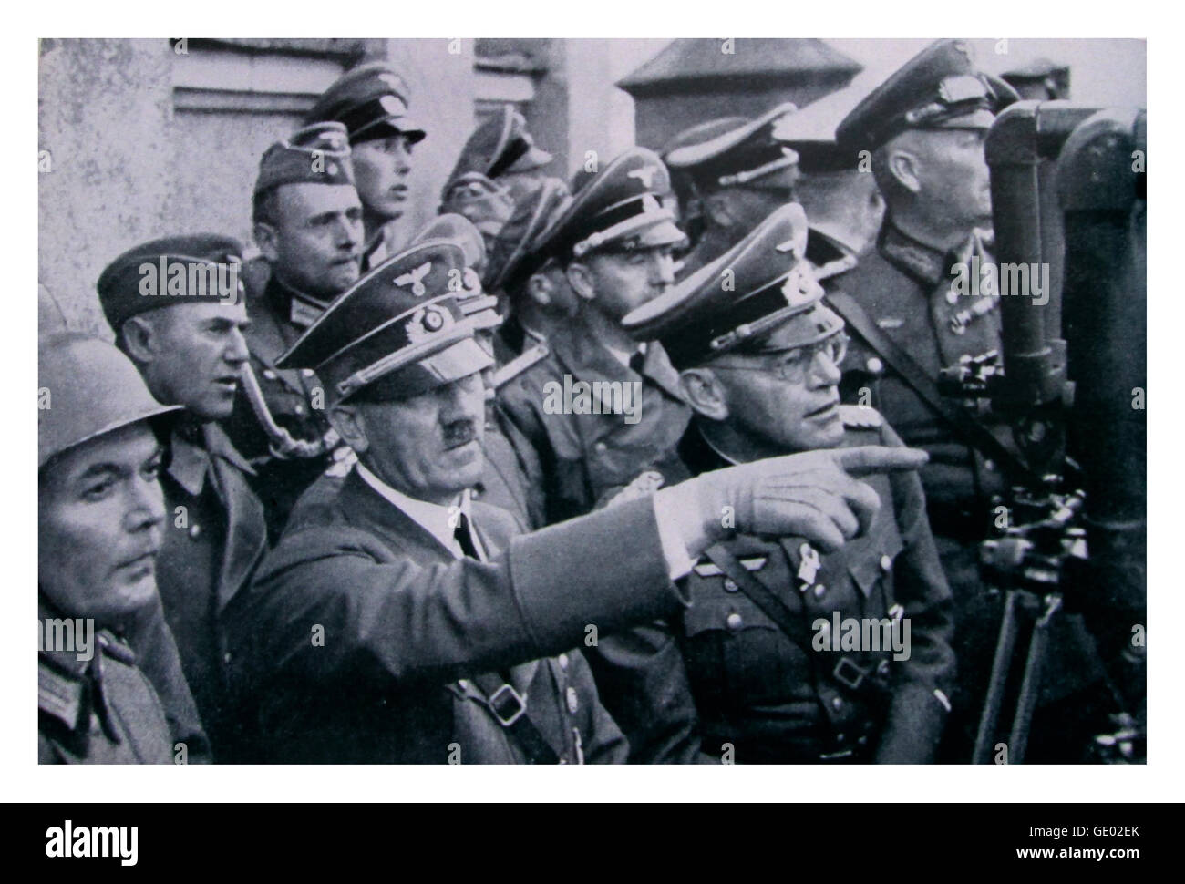 Adolf Hitler Poland invasion occupation with high ranking army officers watches a battle being waged outside Warsaw Poland in 1939. Stock Photo