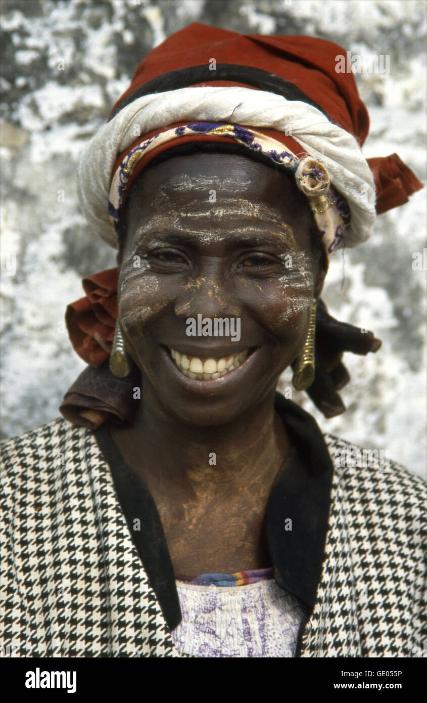 The widow of a fisherman lost at sea wears bereavement face paint for a two month period of mourning – Beyin, Ghana Stock Photo