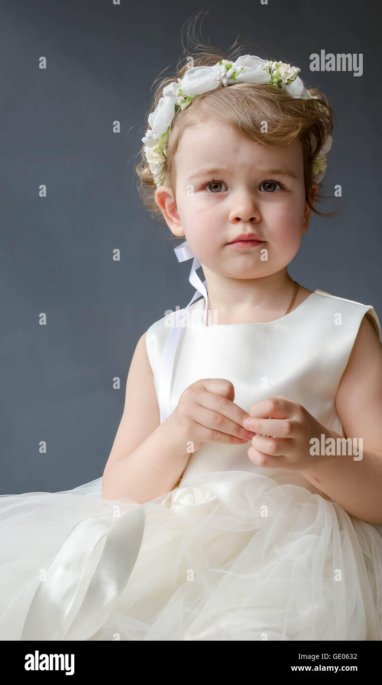 little beautiful baby girl in white dress Stock Photo Alamy