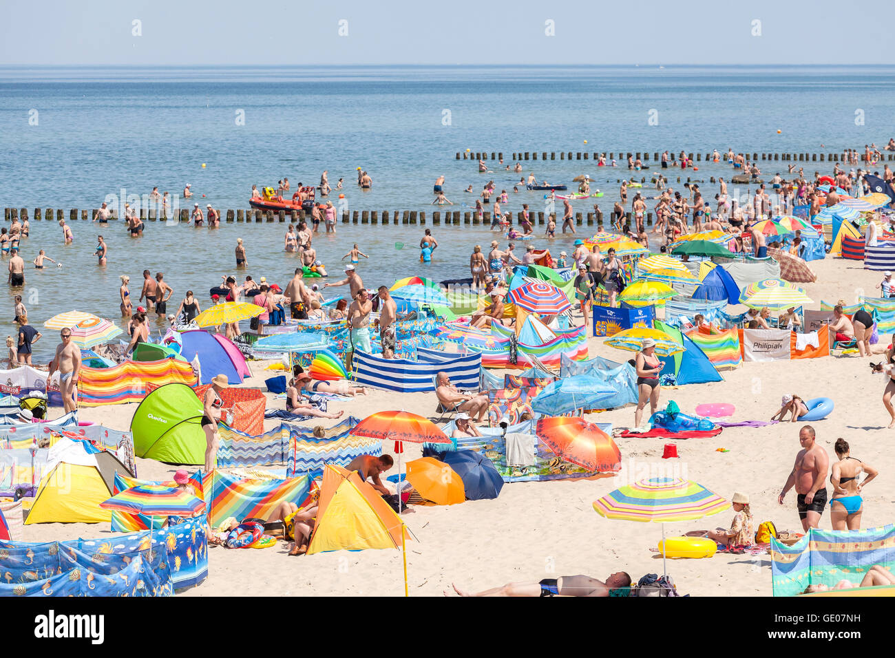 Crowded beach in Dziwnowek, one of the most visited summer spots in the ...