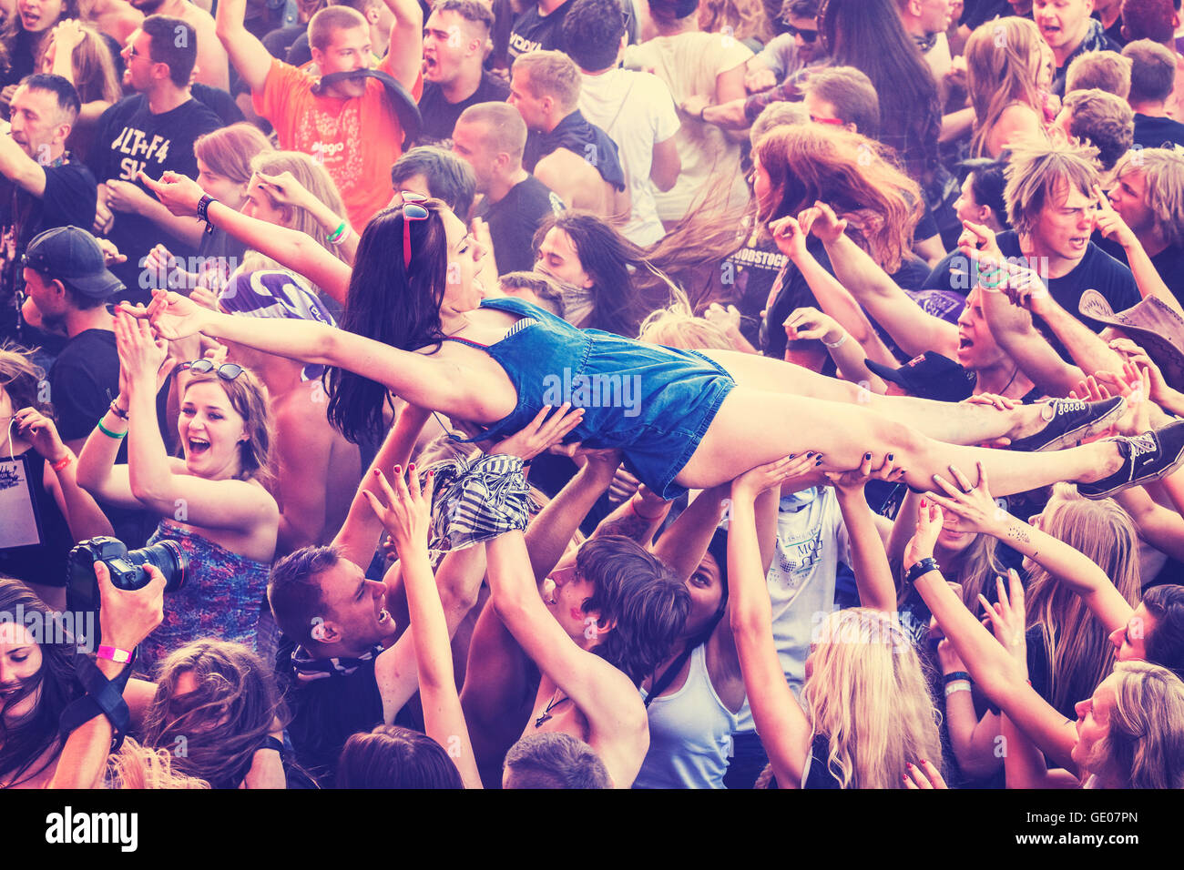 People having fun during concert on the 21th Woodstock Festival Poland. Stock Photo