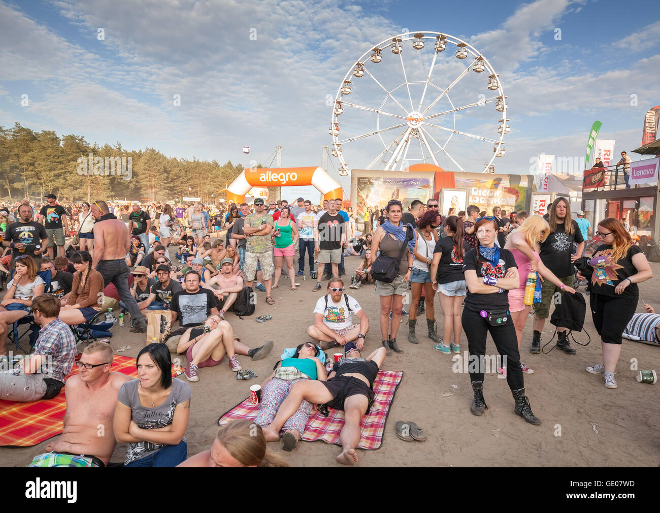 People waiting for concert in front of main stage on the 21th Woodstock Festival Poland. Stock Photo