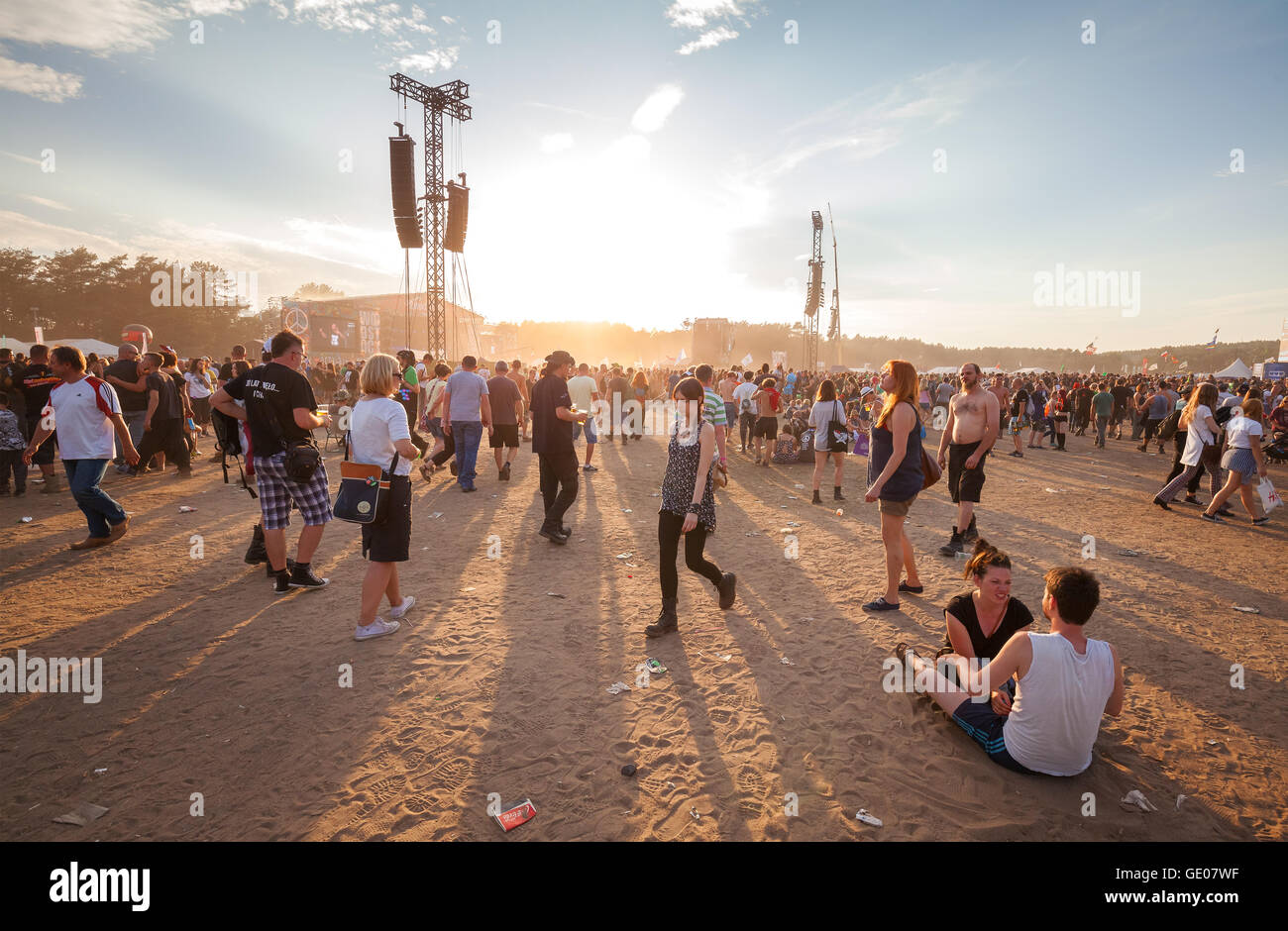 People waiting for concert at sunset on the 21th Woodstock Festival Poland. Stock Photo