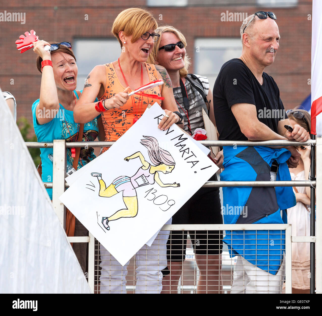 SZCZECIN, POLAND - JULY 06, 2014: Fans and supporters during first Triathlon Szczecin Race. Stock Photo