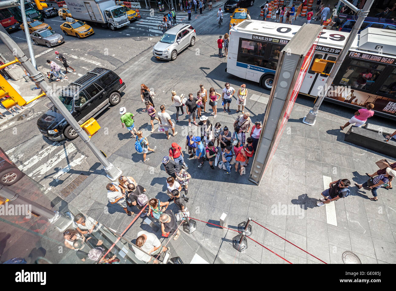 New York, USA - August 17, 2015: Wide angle picture of people on the Times Square, called by many as the heart of the world. Stock Photo