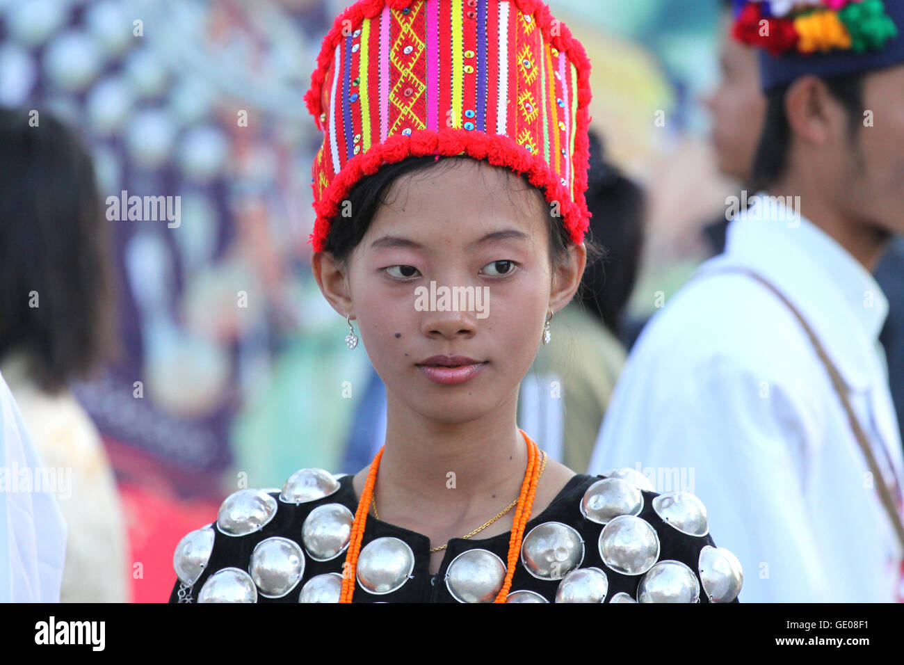 Unidentified Burmese women preparing traditional costumes for a show during the Manaw Festival on January 07, 2010. Stock Photo