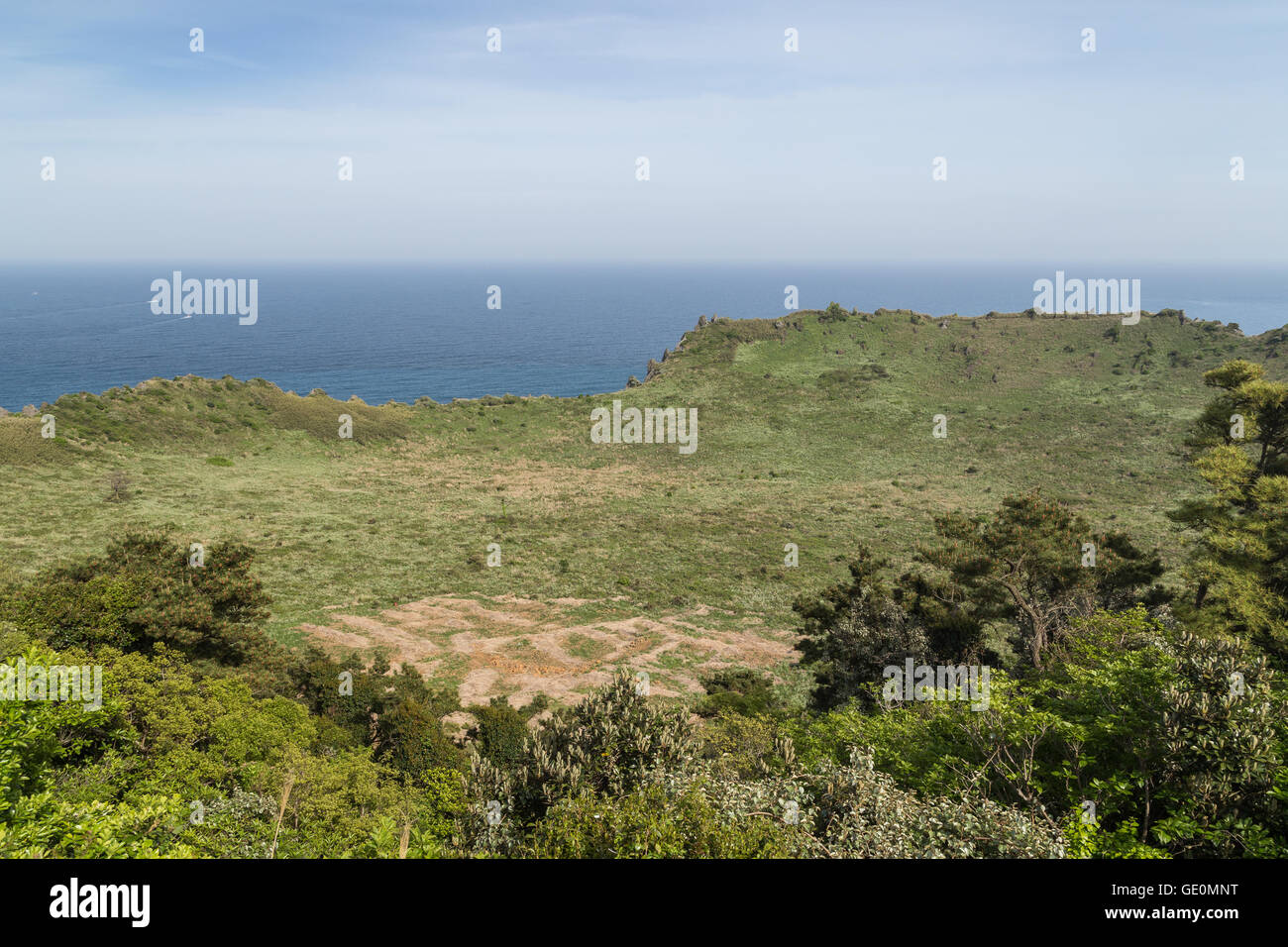 View of volcanic crater at the Seongsan Ilchulbong Peak on Jeju Island in South Korea. Stock Photo
