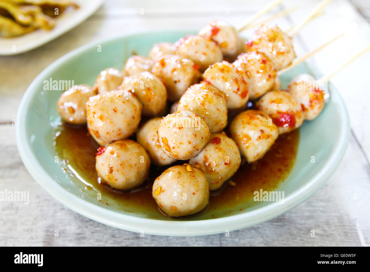 Grilled meat ball with sweet and spicy sauce Stock Photo