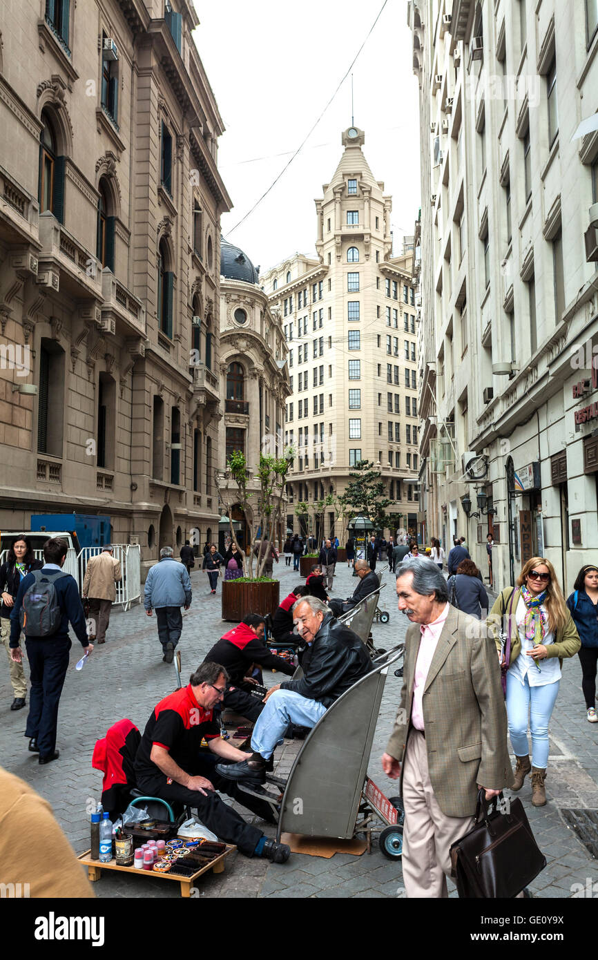 Busy street in the city center, people in everyday situations. Stock Photo