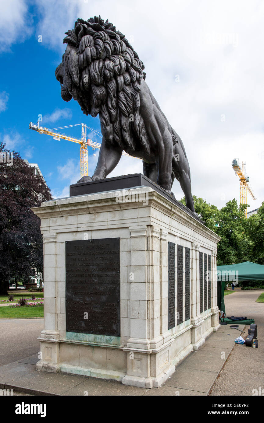 A statue of a lion in the Forbury Gardens in Reading, UK Stock Photo