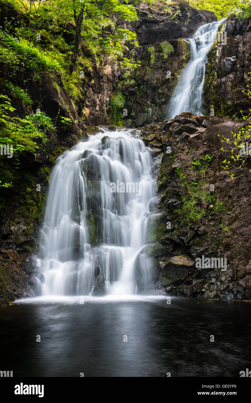 A well hidden wonder in the village of Uig on Skye is this magnificent double waterfall on the River Rha Stock Photo