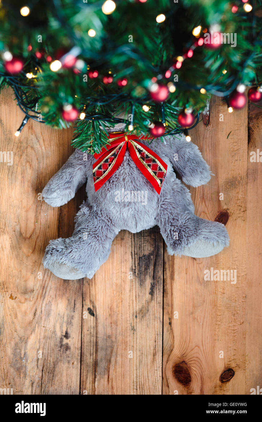 Teddy bear under the Christmas tree Stock Photo