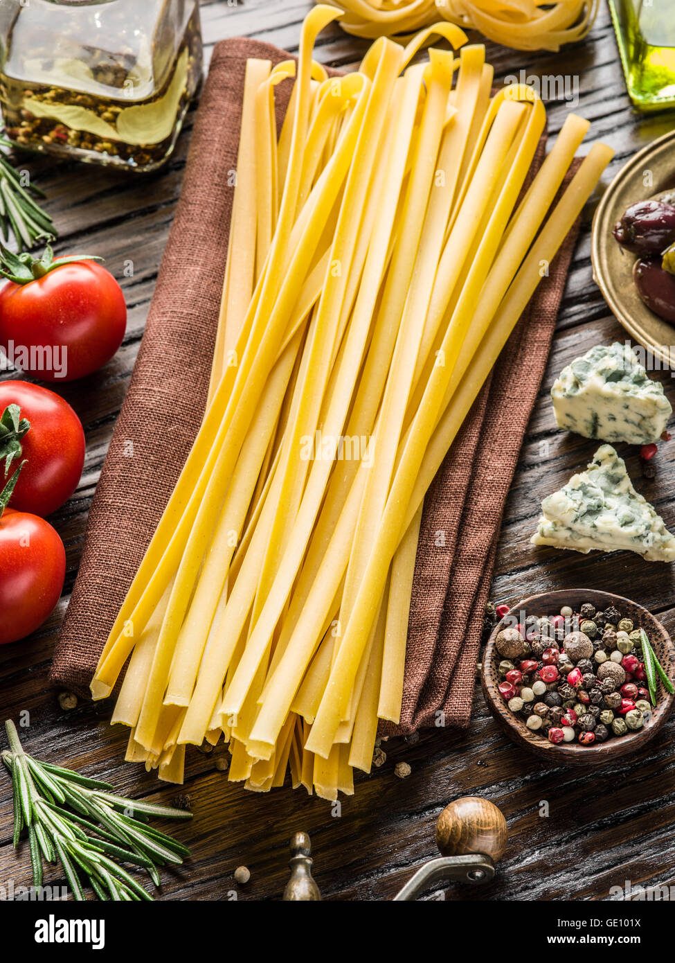 Pasta ingredients. Cherrytomatoes, spaghetti pasta, rosemary and