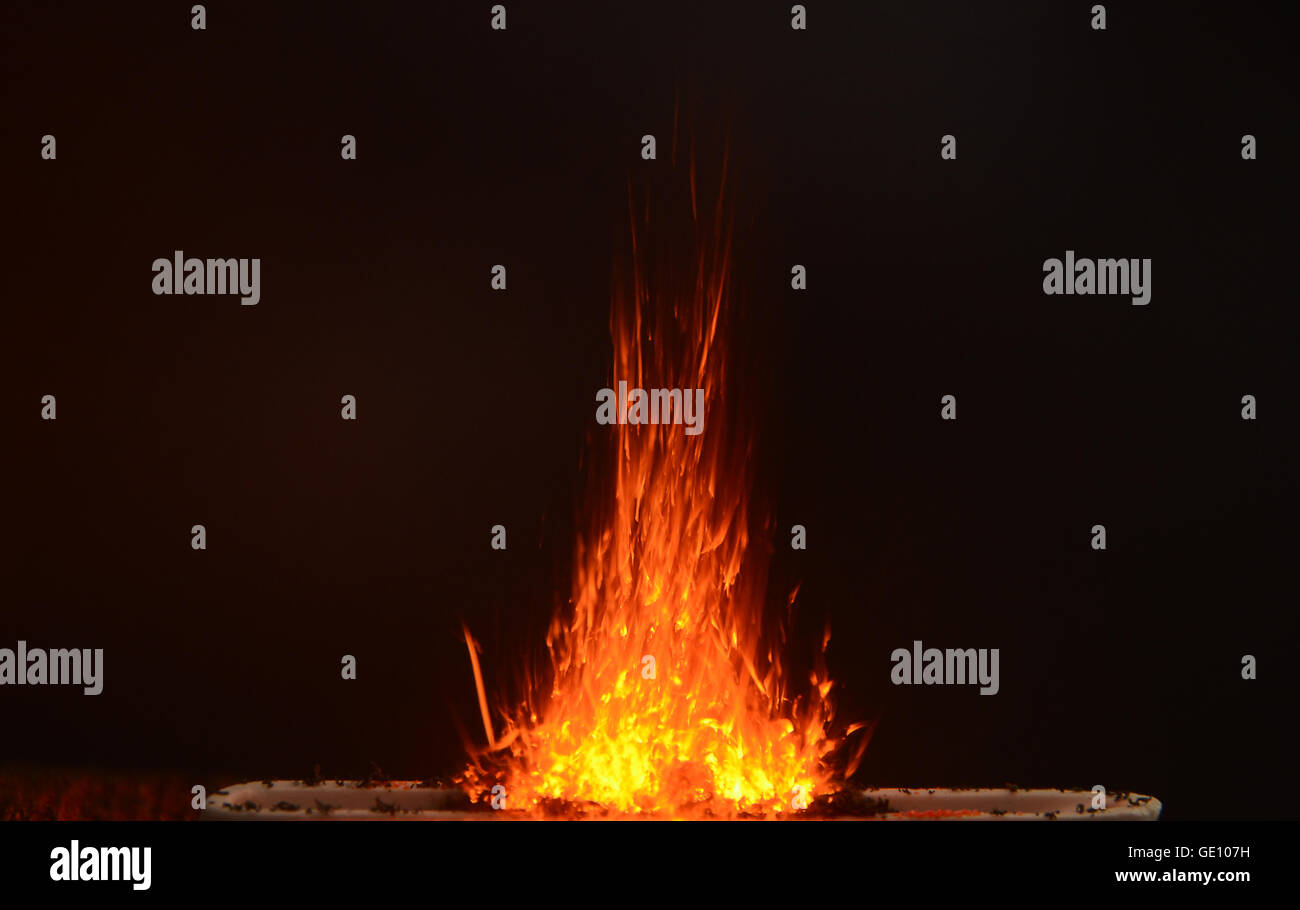 Potassium dicromate heated until a combustion to cromeoxide takes place. Stock Photo