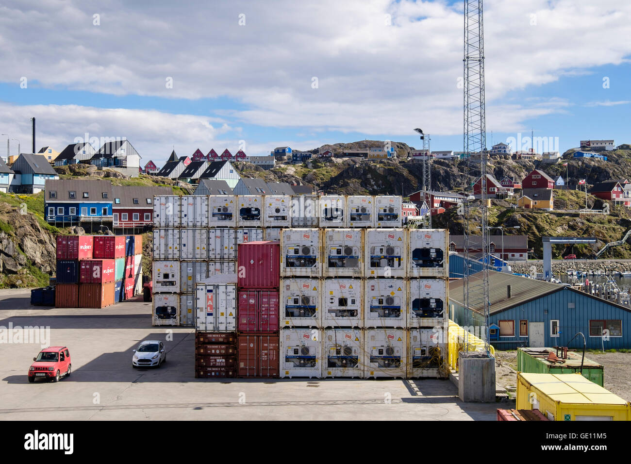 Royal Arctic Line shipping containers with temperature control units stacked on quay in port of Sisimiut Qeqqata West Greenland Stock Photo