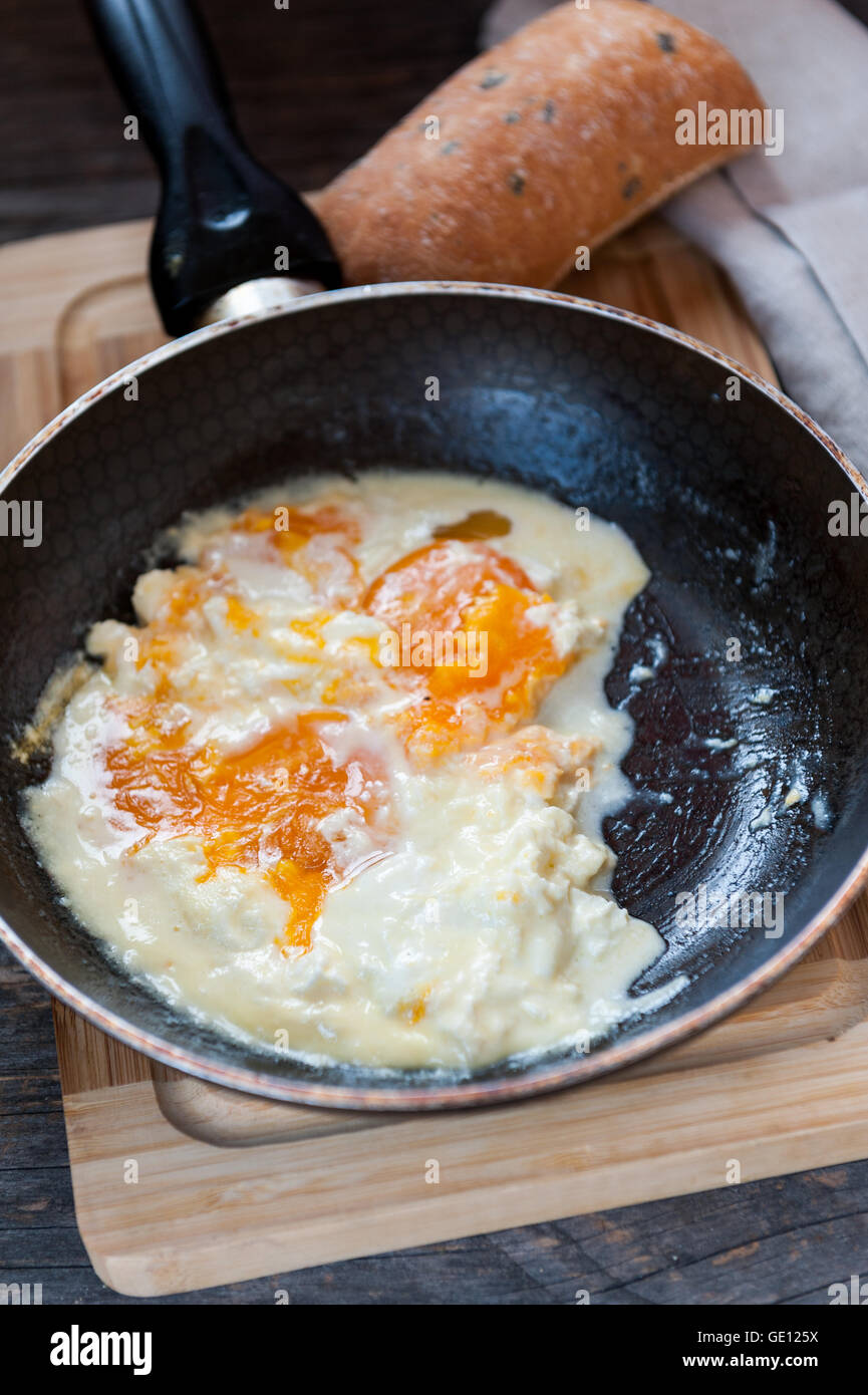 Eggs baked in sour cream Stock Photo Alamy