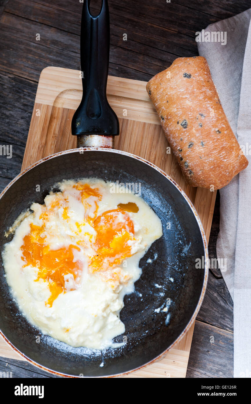 Eggs baked in sour cream Stock Photo Alamy