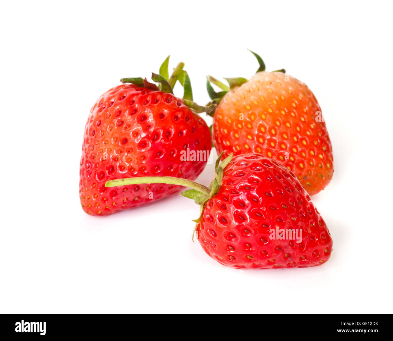 red ripe strawberries isolated on a white background Stock Photo - Alamy