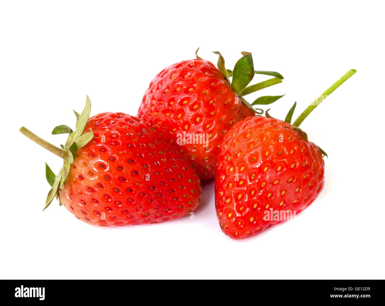 red ripe strawberries isolated on a white background Stock Photo - Alamy