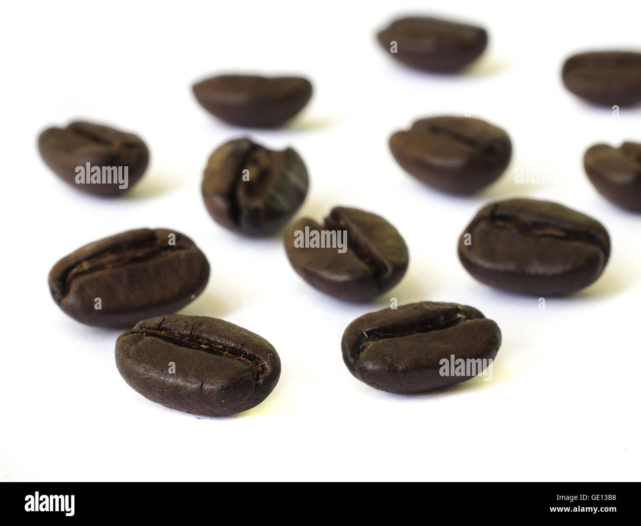 closeup of coffee beans seed on white background Stock Photo Alamy