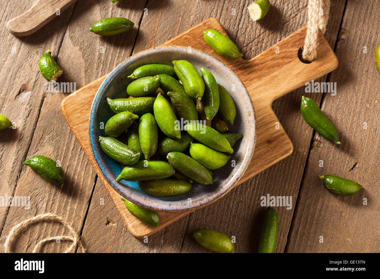 Raw Organic Green Finger Limes Ready for Eating Stock Photo