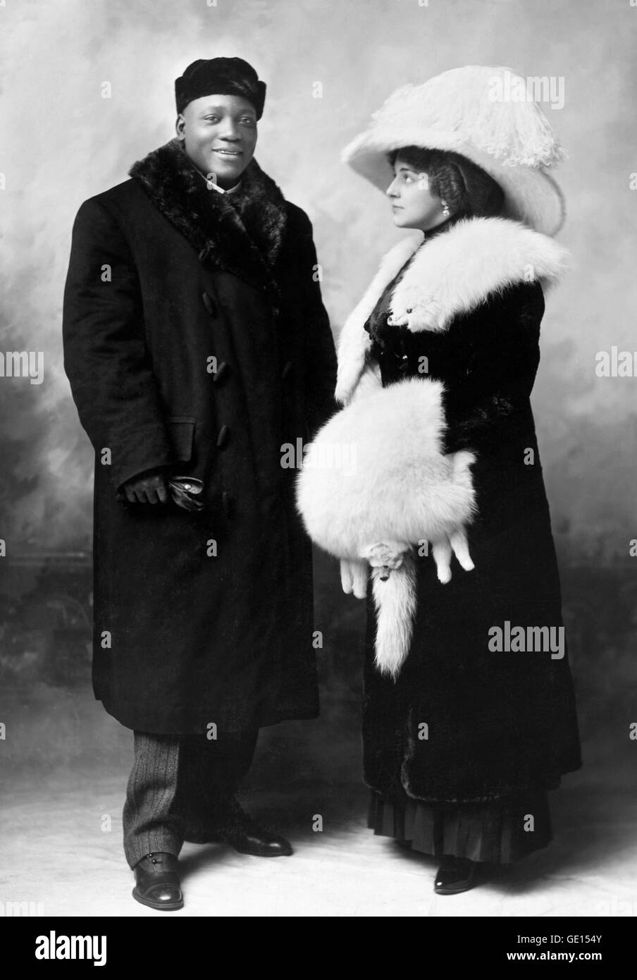 Jack Johnson, heavyweight boxer. Portrait of John Arthur 'Jack' Johnson (1878-1946),  with his wife Etta, by Elmer Chickering c.1910 Stock Photo