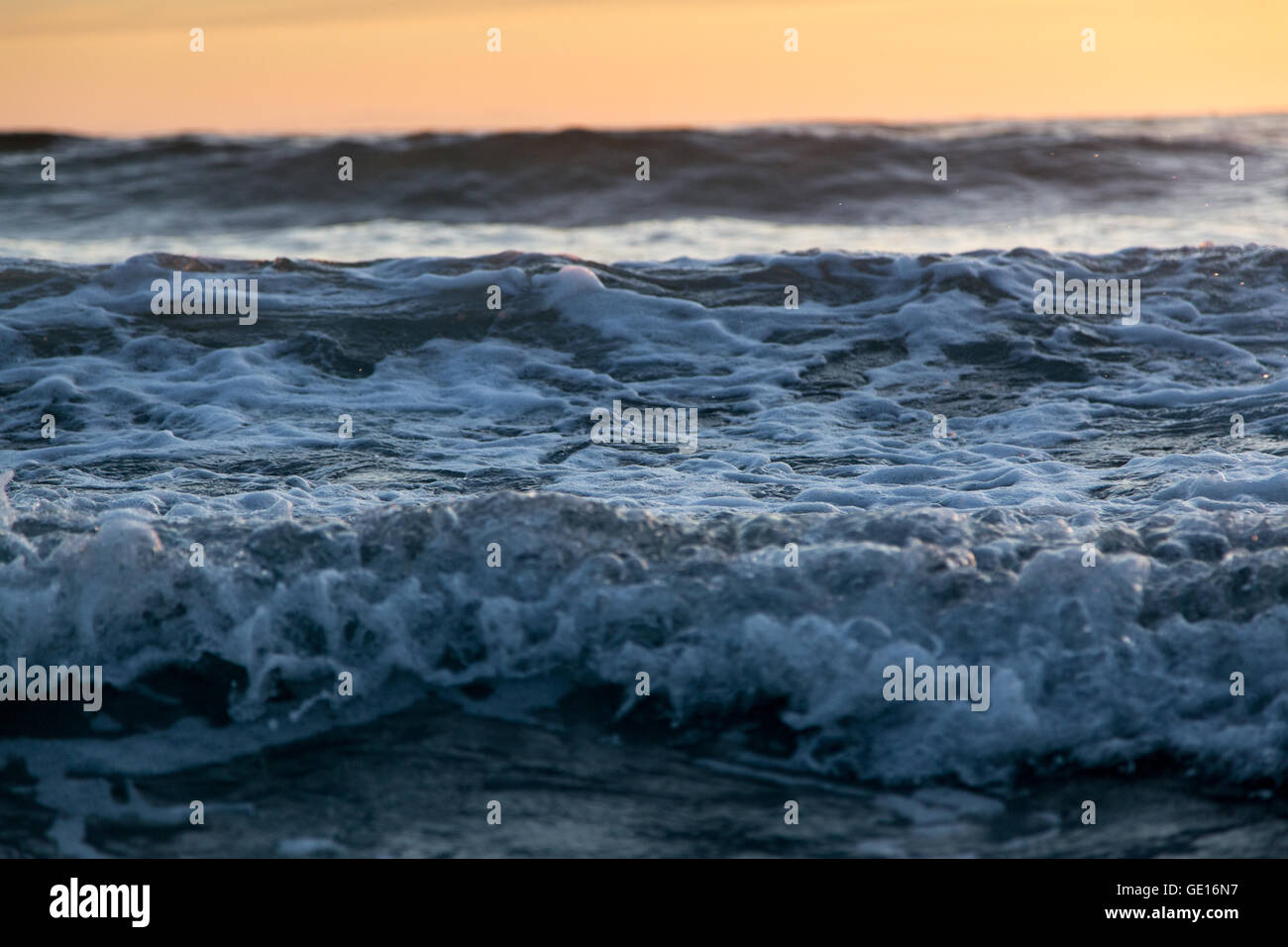 Waves crash on Newport Beach in Los Angeles, California. Stock Photo