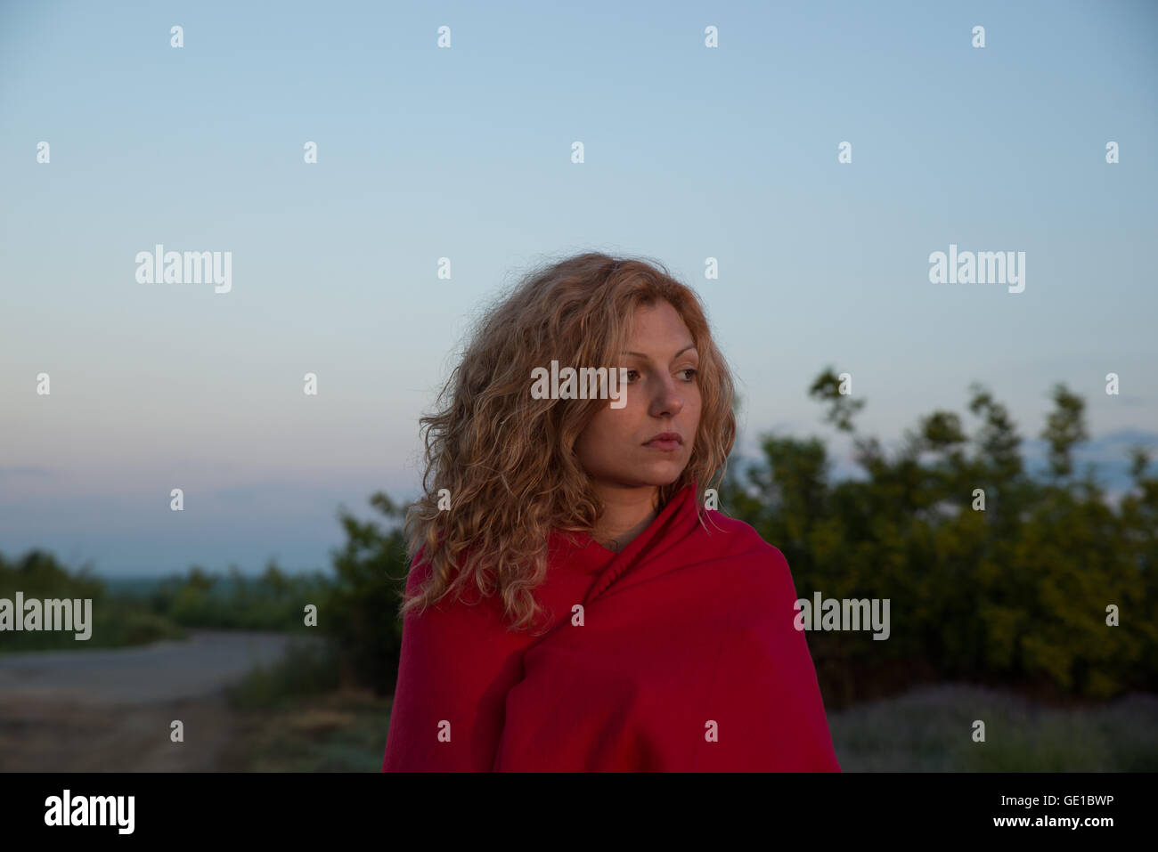 Woman standing outdoors hi-res stock photography and images - Alamy
