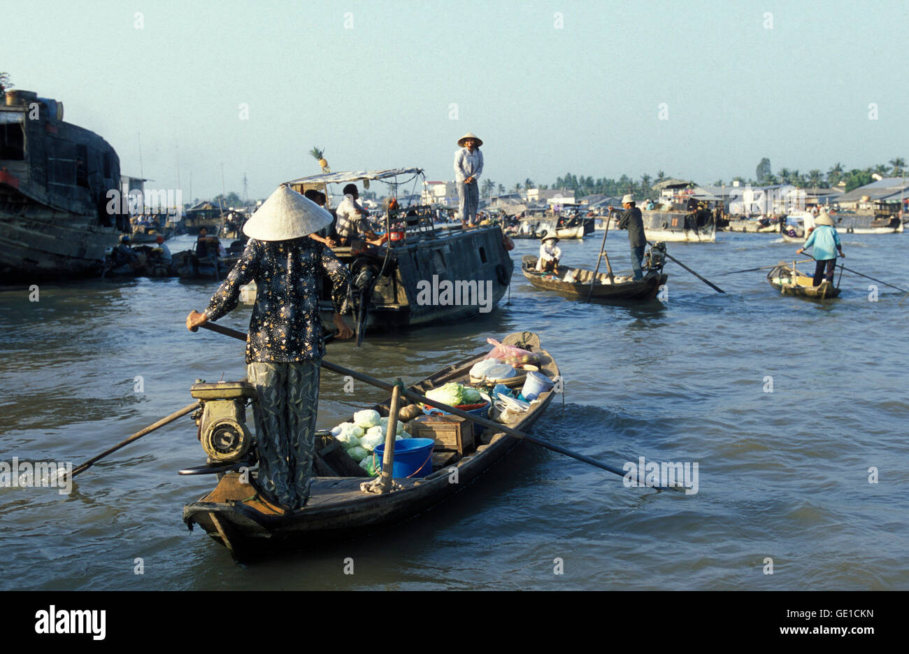 People at the Flooting Market on the Mekong River near the city of Can Tho in the Mekong Delta in Vietnam Stock Photo