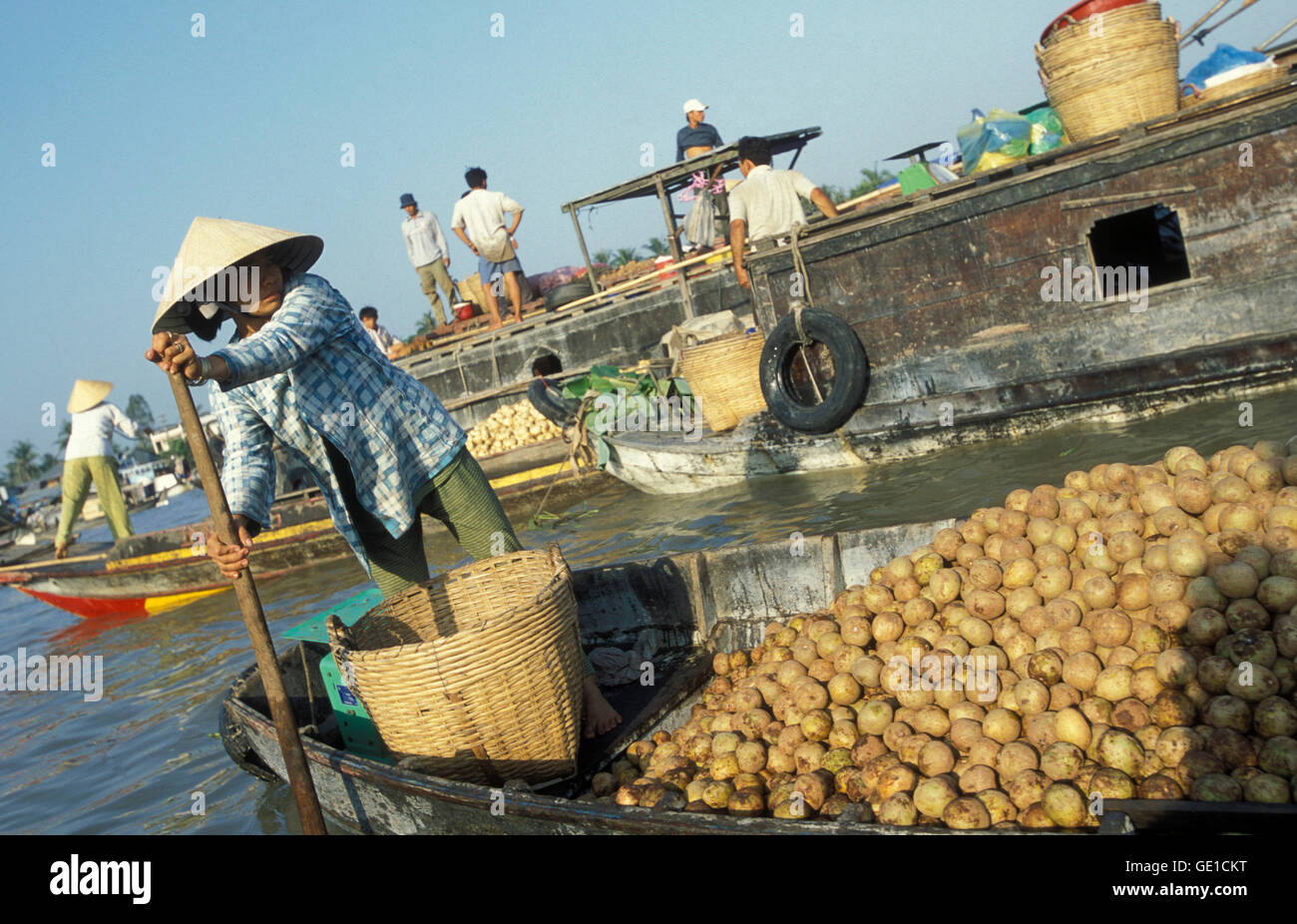 People at the Flooting Market on the Mekong River near the city of Can Tho in the Mekong Delta in Vietnam Stock Photo