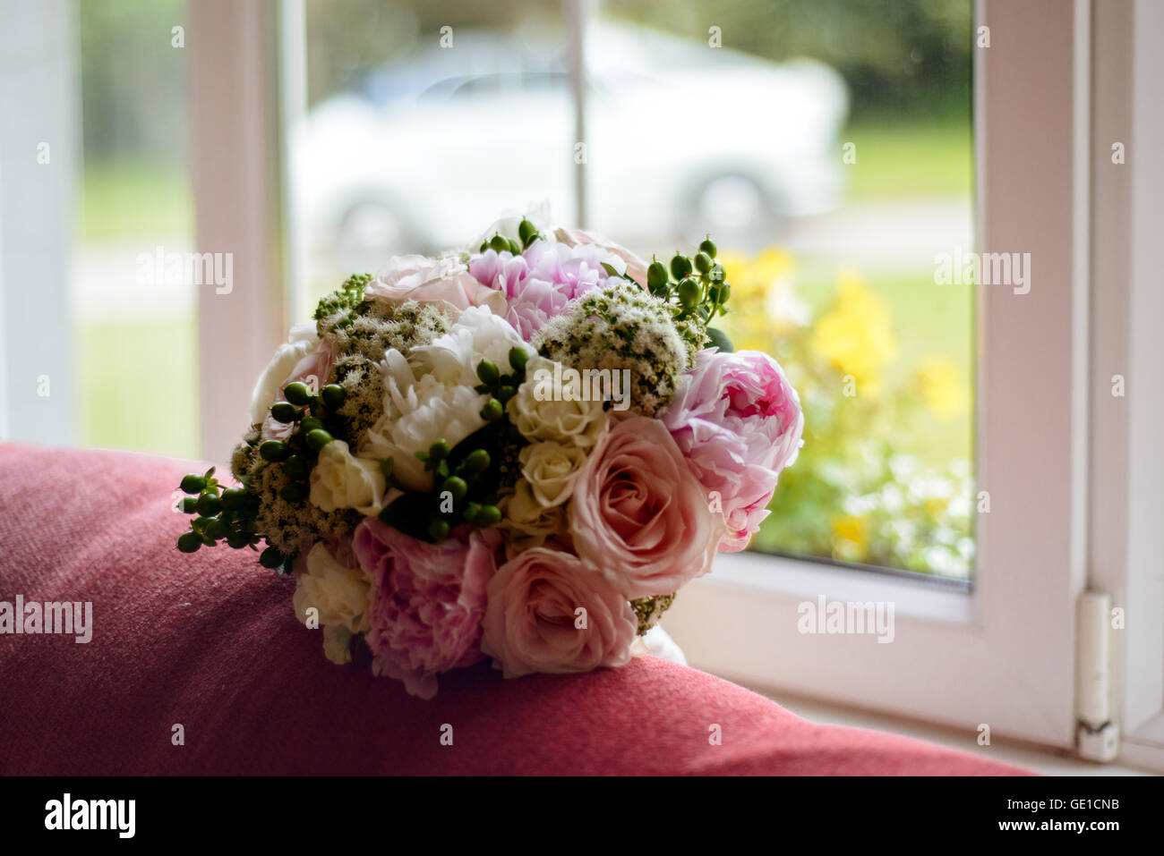 wedding bouquet on couch Stock Photo