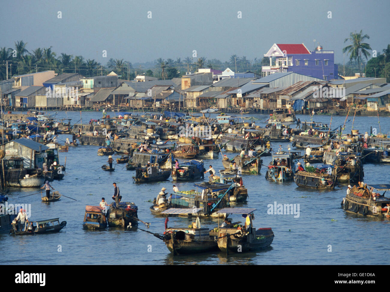 People at the Flooting Market on the Mekong River near the city of Can Tho in the Mekong Delta in Vietnam Stock Photo