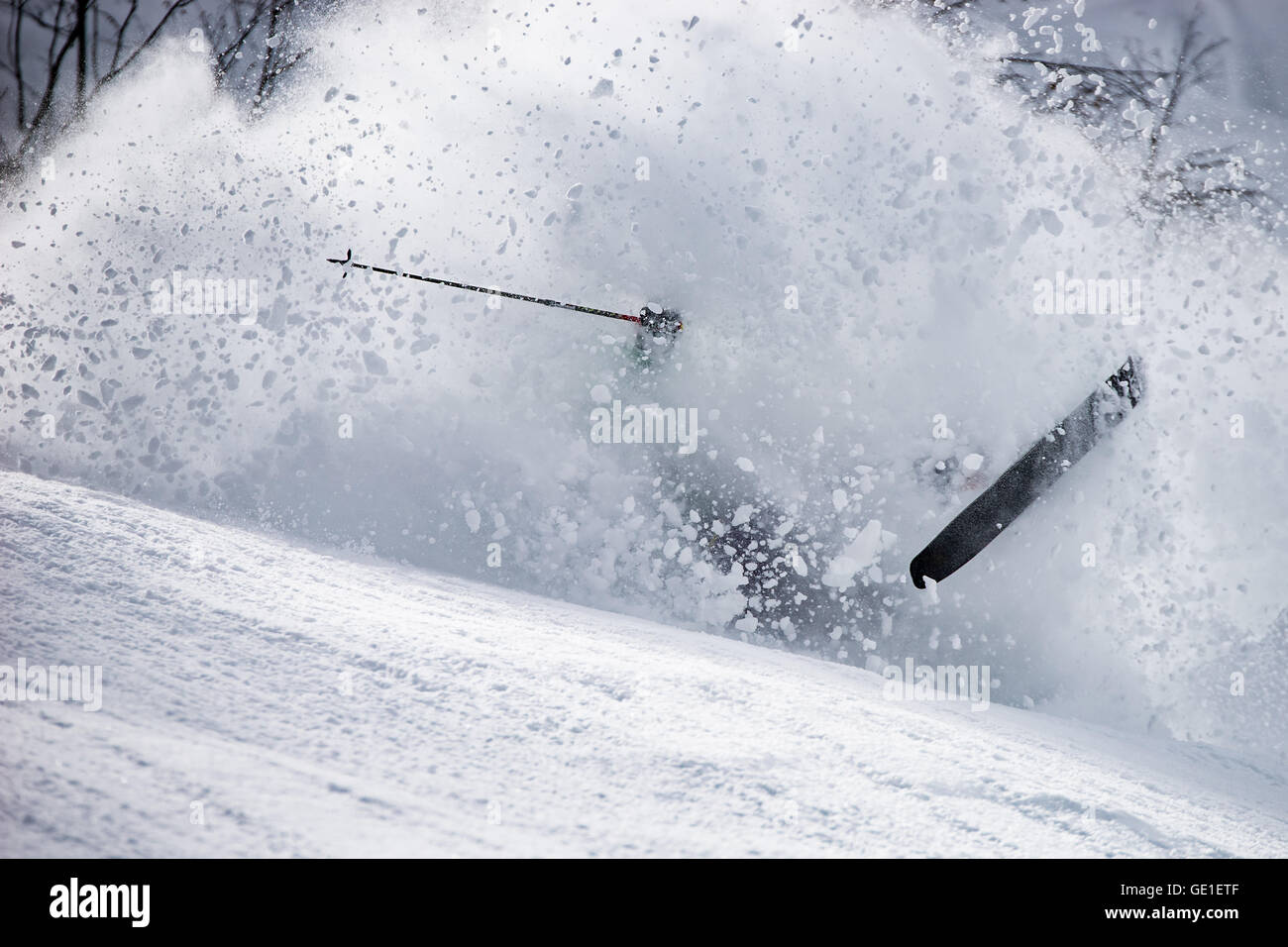 Skier falling over, Alps, Gastein, Austria Stock Photo