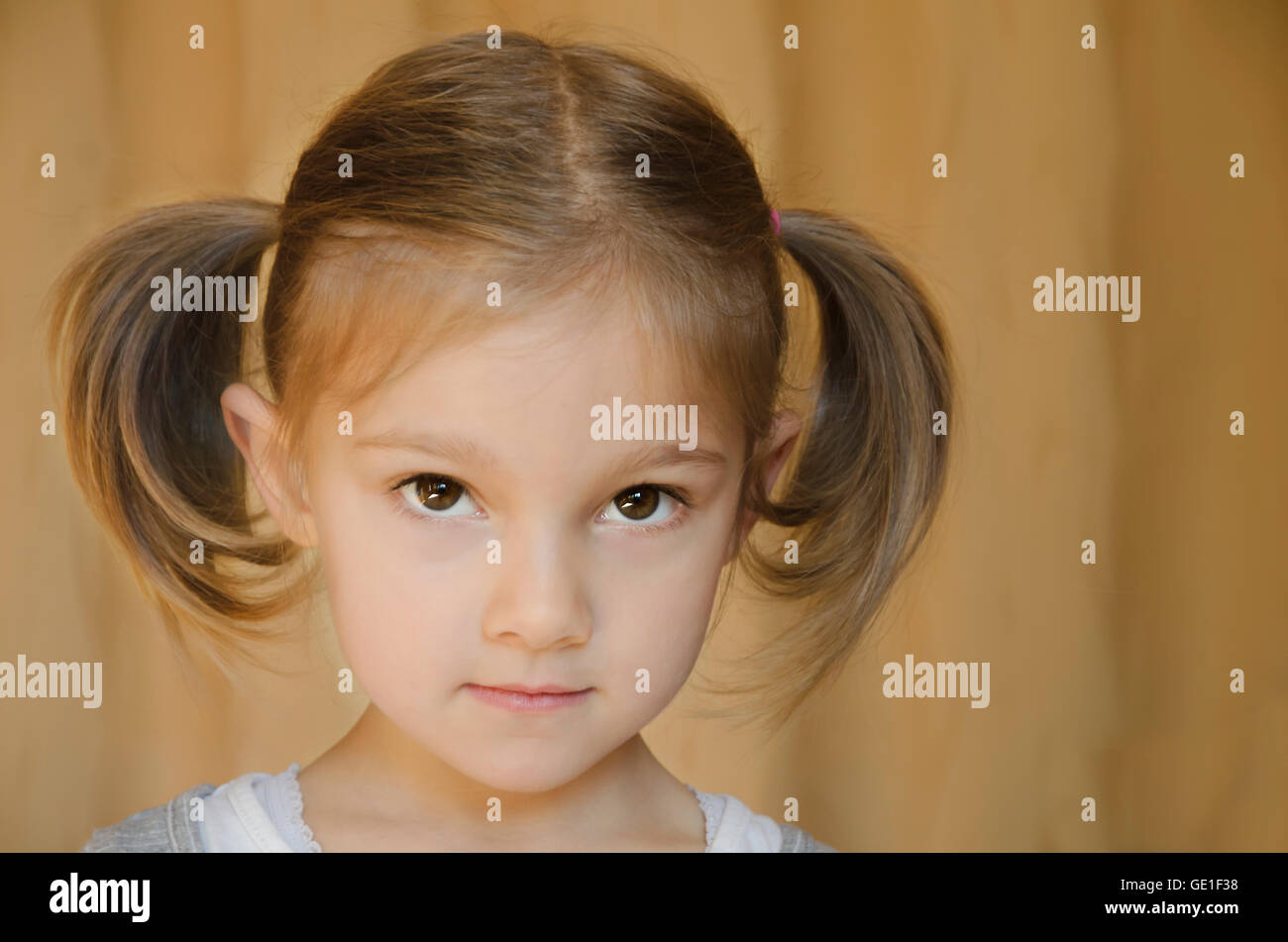 Portrait of a girl with pigtails Stock Photo