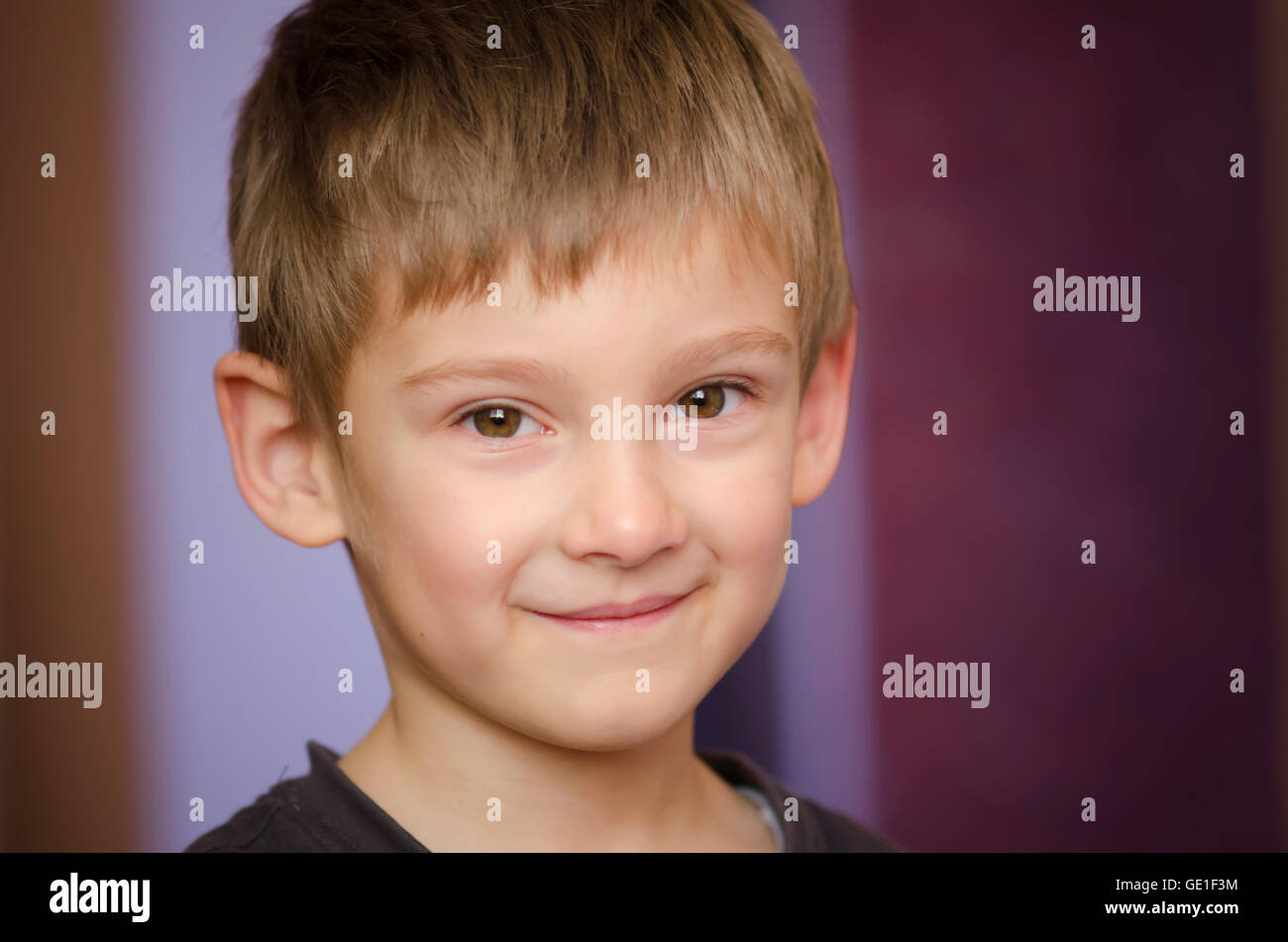 Portrait of a smiling boy Stock Photo - Alamy