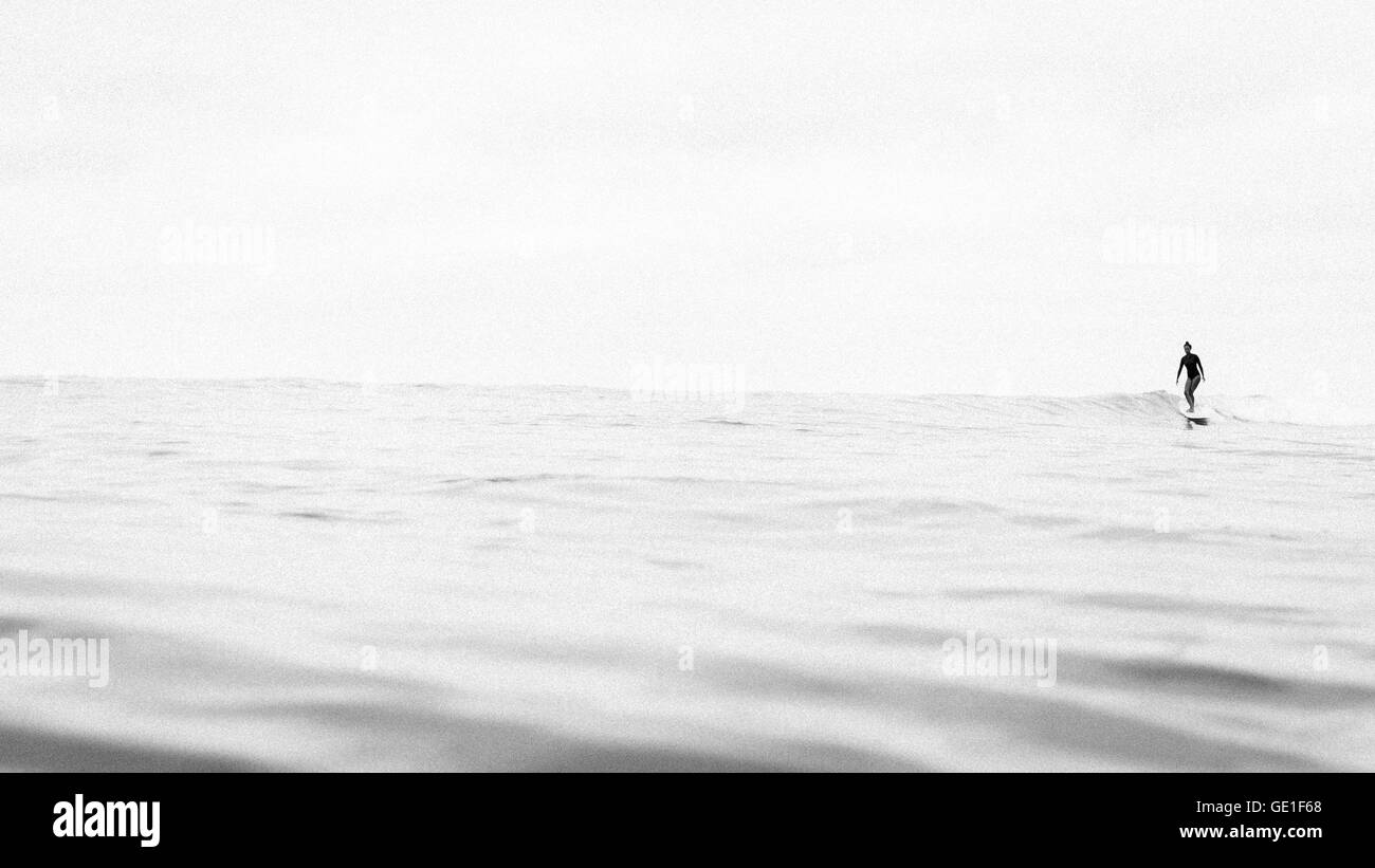 Woman surfing, Malibu, california, United States Stock Photo