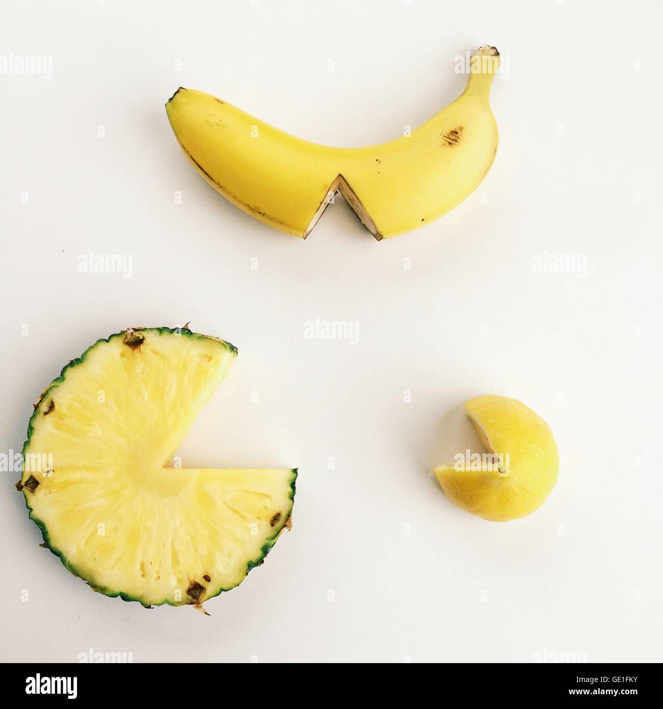 Fruit with wedge sections missing Stock Photo