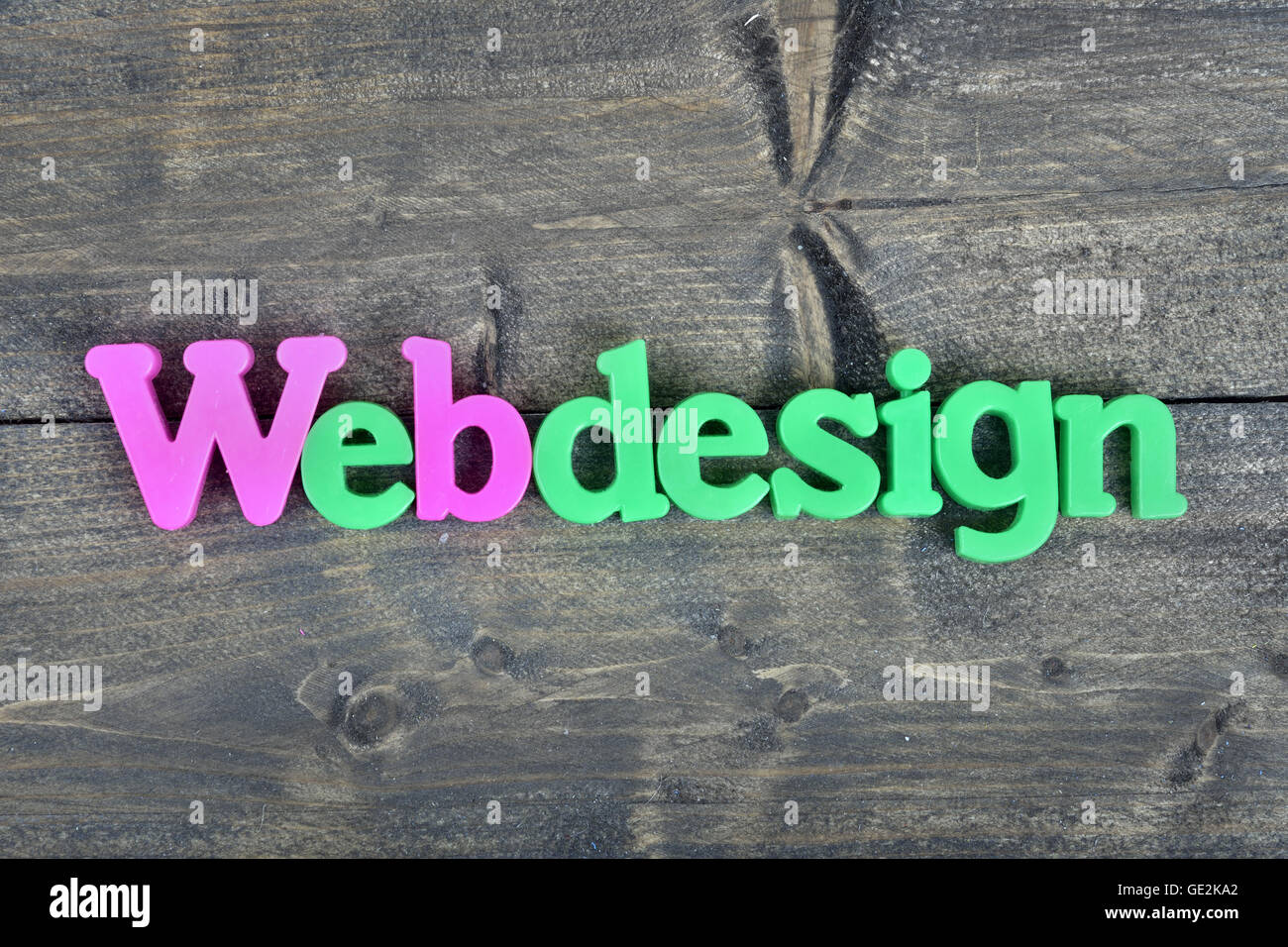 Webdesign word on wooden table Stock Photo