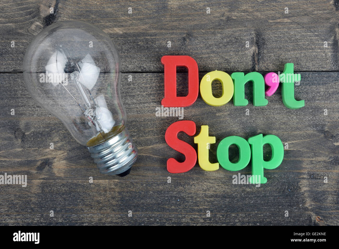 Stop Word Not Sign Don't stop word on wooden table Stock Photo - Alamy