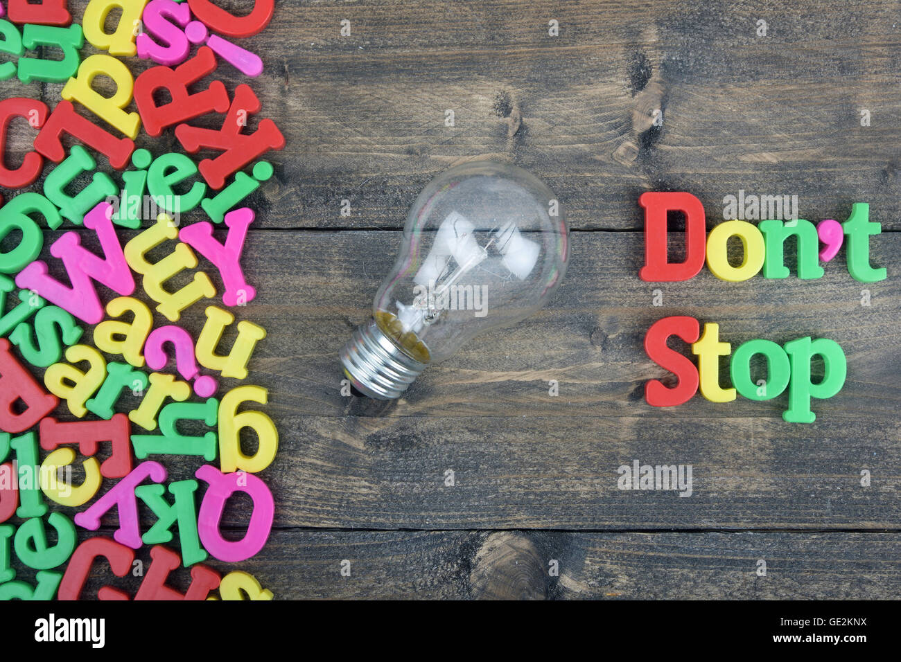 Stop Word Not Sign Don't stop word on wooden table Stock Photo - Alamy