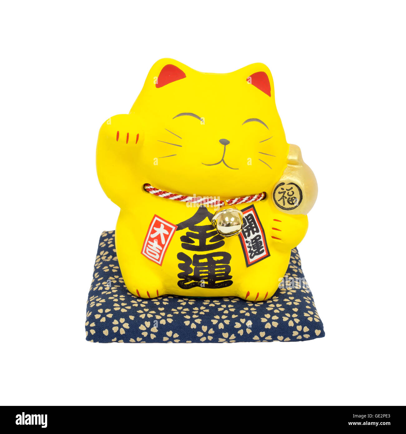 Maneki Neko, Yellow lucky cat isolated on white background Stock Photo