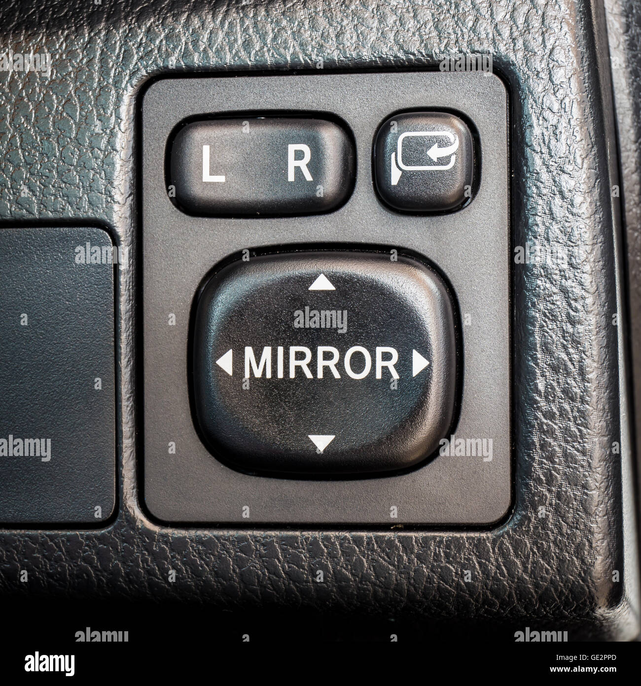 Switch button adjust or controls side mirrors in a car Stock Photo Alamy