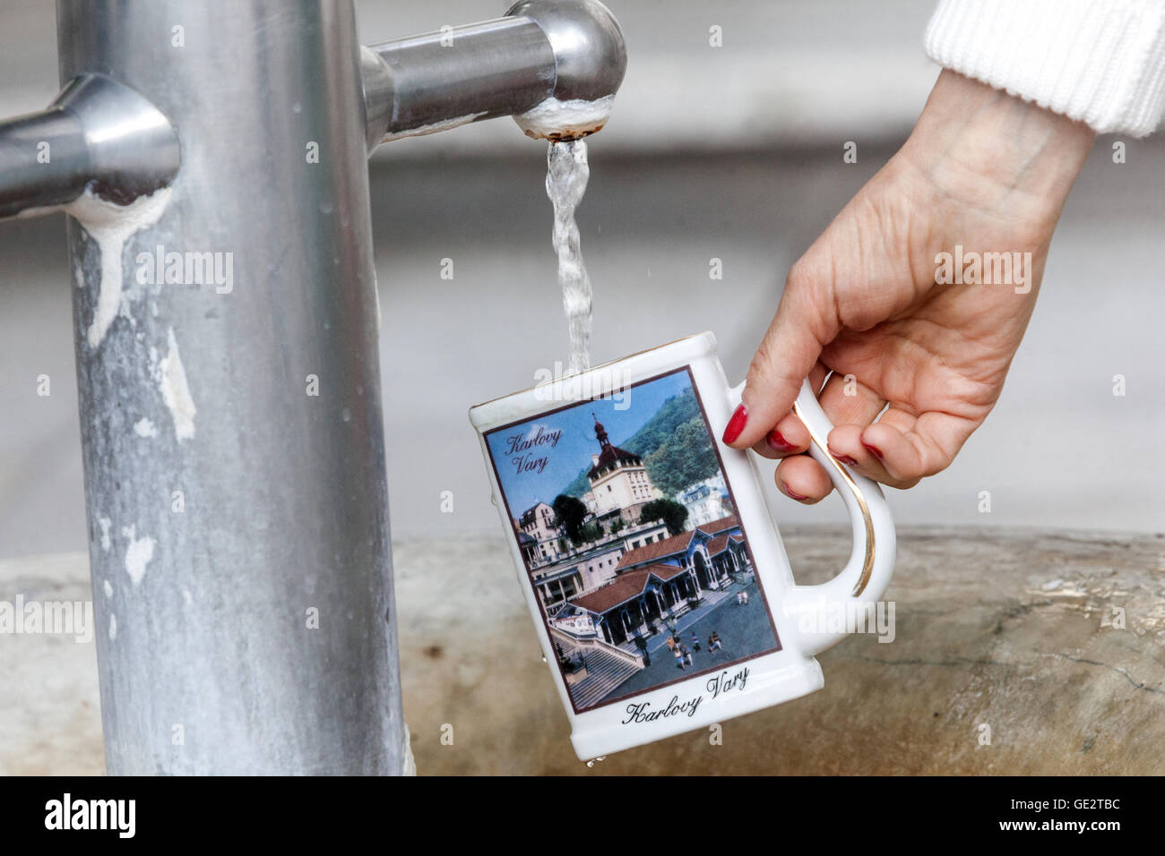 Spa cup for mineral water drink, Karlovy Vary spa town, West Bohemia, Czech Republic Stock Photo