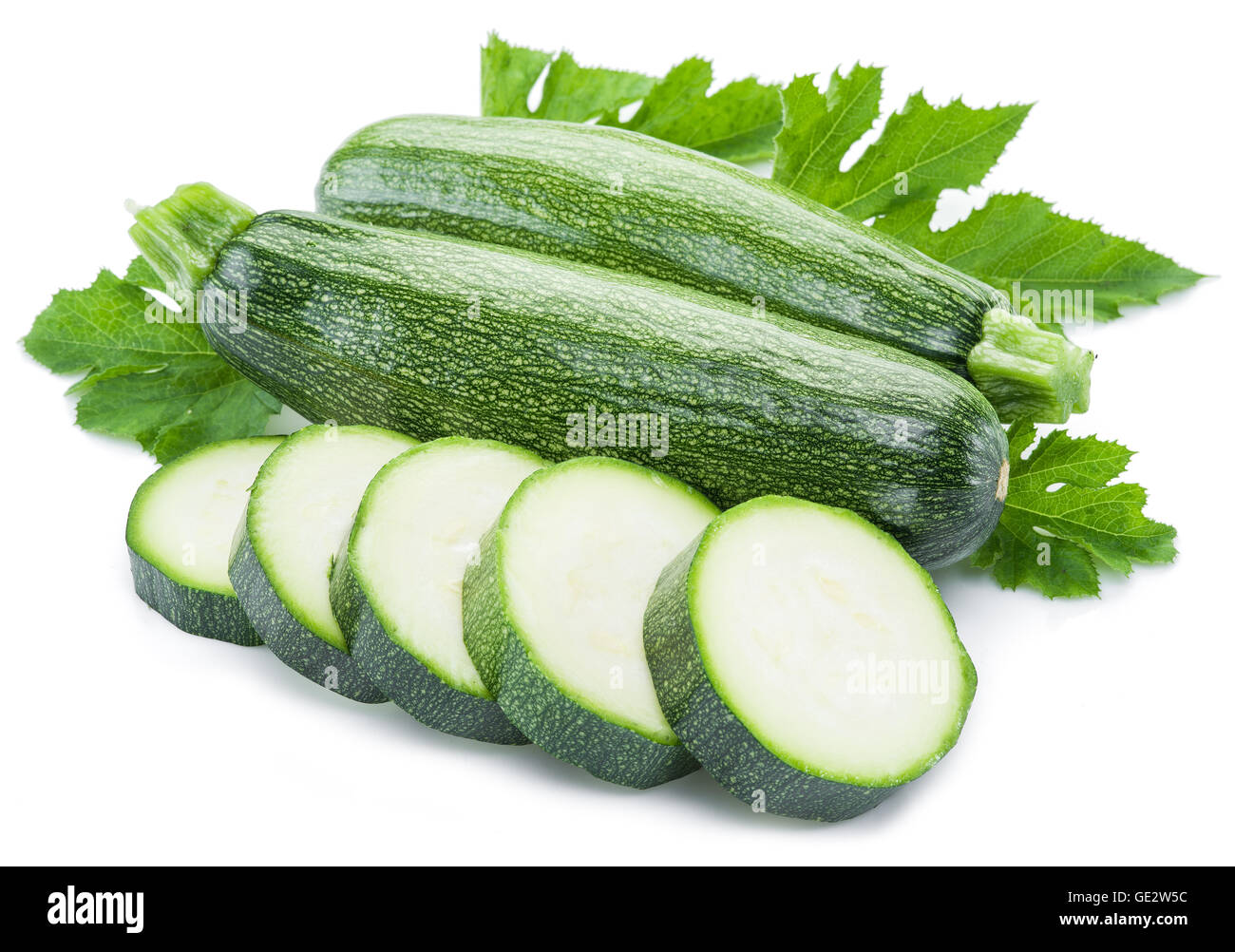 Zucchini with slices on a white background. Stock Photo