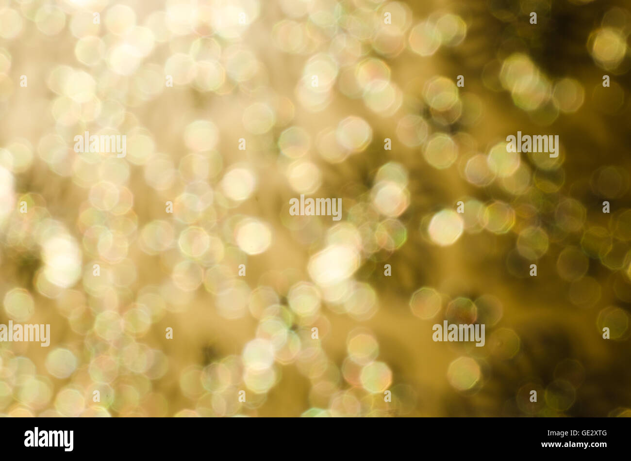 golden abstract holiday bokeh lights background Stock Photo - Alamy