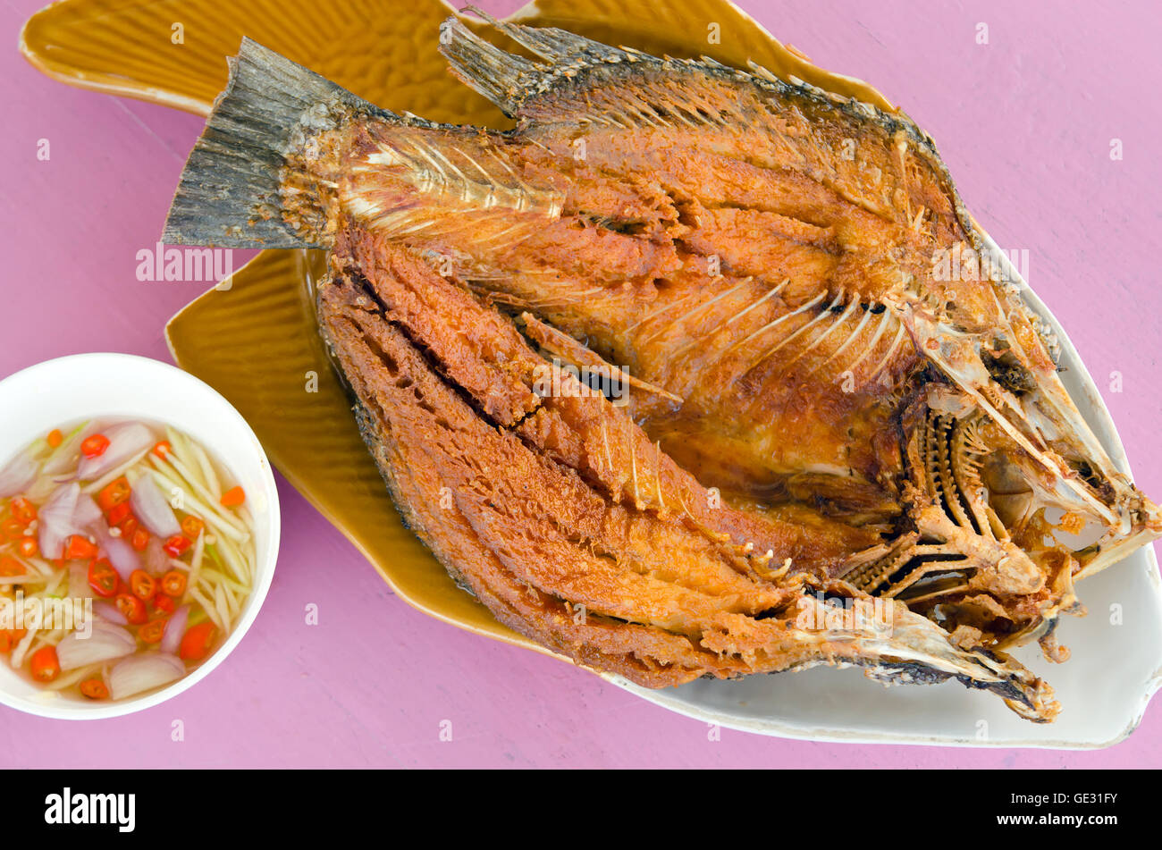 Thai food menu Oyster sauce over fried striped bass fish (famous thai