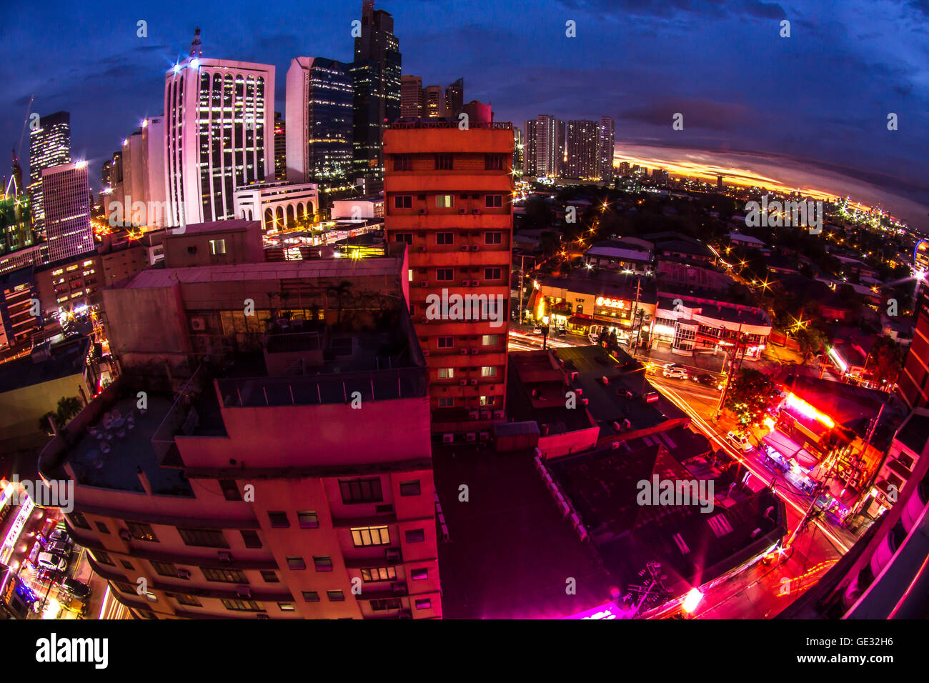Landscape urban Makati Manila Philippines arquitecture skyline skyscraper redlight sunset Stock Photo