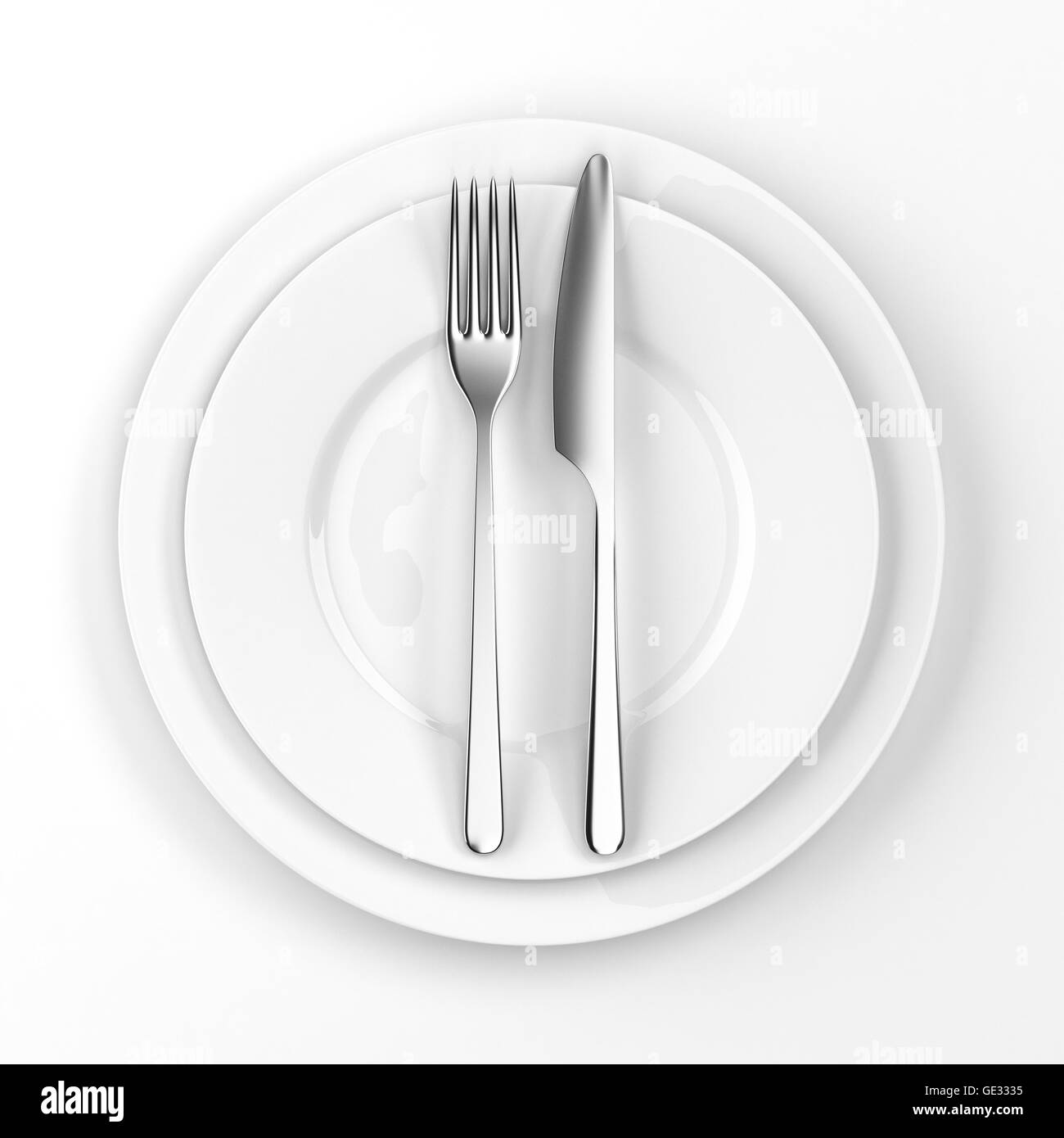 Fork and knife with plates Stock Photo Alamy