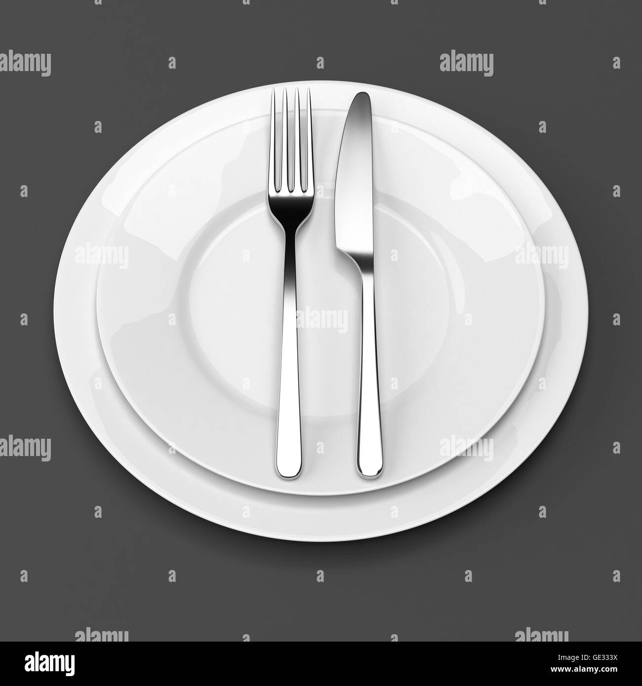 Fork and knife with plates Stock Photo Alamy