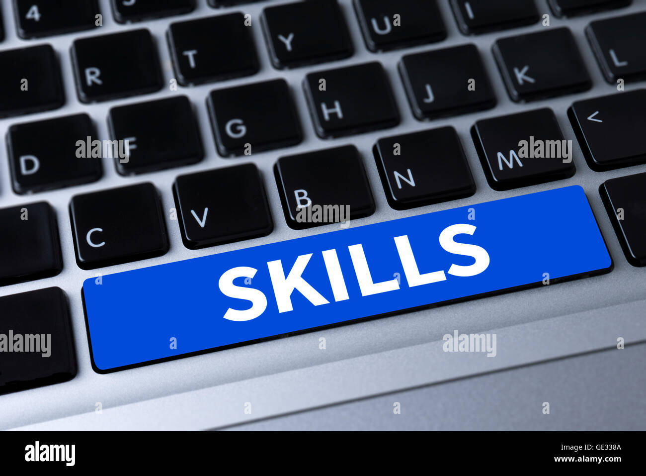 SKILLS a message on keyboard Stock Photo - Alamy